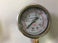Đồng hồ đo áp suất Ligi chân đồng đứng 8A, vỏ inox dầu D63  P10kg 140psi